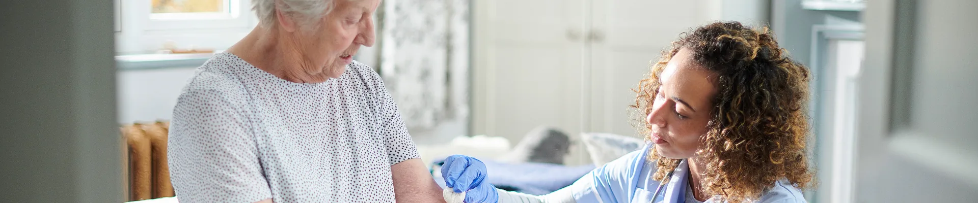 A West-Med doctor examining a patient